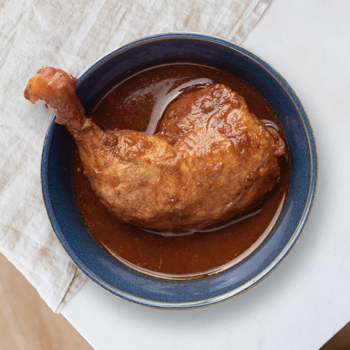 まるごとチキンレッグ入りスープカレー　あっさりトマト味